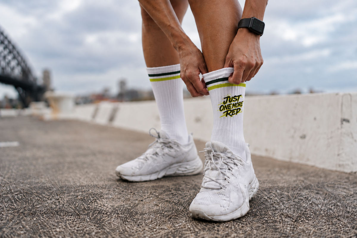 Sporter met Just One More Rep sportsokken